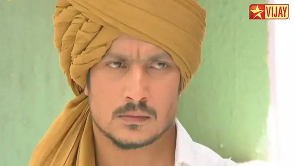 Karna threatens Naresh