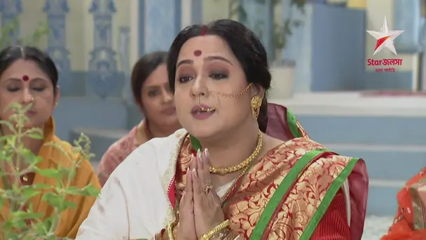 Mamoni Performs a Puja