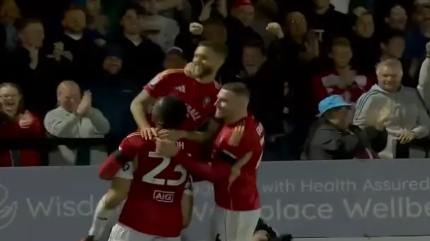 THROUGH THE LEGS! Jorge Grant fires Salford City ahead