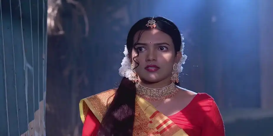 Srijan Applies Turmeric to Parna's Hands - Neem Phooler Madhu
